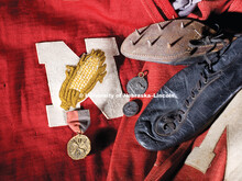 Memorabilia for old calendar project. Vintage shirts, running shoes, metals. 