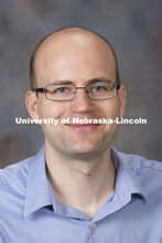 Studio portrait of Brandon Bosch, Assistant Professor, Sociology.  August 20, 2014. 