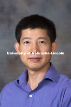 Studio portrait of Jiangang Xia, Assistant Professor, Educational Administration, August 20, 2014. 