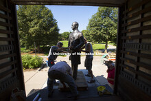 The statue of J. Sterling Morton gets its first view of East Campus on Monday morning. Statues of th