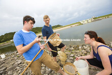 Alex Contino, Ryan Nathan and Gini Phillips compare results of their search for crawfish to be part 