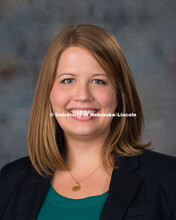 Studio portrait of Melanie Downs, New Faculty Photo Shoot, August 19, 2015. 