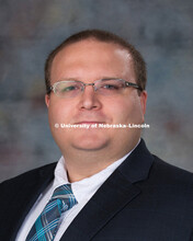 Studio portrait of Christopher Mann, New Faculty Photo Shoot, August 19, 2015. 