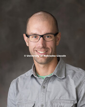 Studio portrait of Christopher Proctor, New Faculty Photo Shoot, August 19, 2015. 