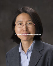 Studio portrait of Yue Zhang, New Faculty Photo Shoot, August 19, 2015. 