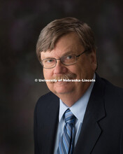 Studio portrait of John Osterman, interim director and associate professor of biological sciences. S