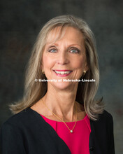 Studio portrait of Jayne Sutton, University Affairs, October 17, 2015. 