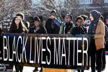 Carnetta Griffin acknowledges the crowd as she leads the rally. Black Lives Matter rally filled the 