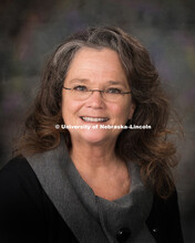 Studio portrait of Julie Dexter, Procurement Services. February 10, 2016. 