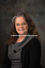 Studio portrait of Julie Dexter, Procurement Services. February 10, 2016. 