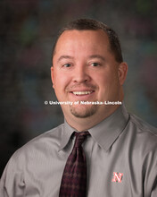 Studio portrait of Dustin Kotik, Procurement Services. February 10, 2016. 