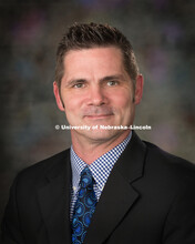 Studio portrait of Bradley Logan, Procurement Services. February 10, 2016. 