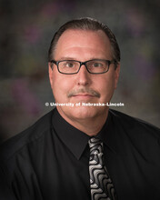 Studio portrait of John Lohmeier, Procurement Services. February 10, 2016. 