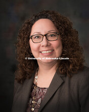 Studio portrait of Nicole McCoid, Procurement Services. February 10, 2016. 