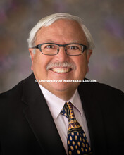 Studio portrait of William Lopez, Professor, Teaching, Learning and Teacher Education, CEHS. March 2