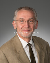 Studio portrait of Brett Barney, Library faculty/staff photo for web. May 4, 2016. 