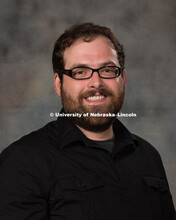 Studio portrait of Nathan Bicak, Assistant Professor. New Faculty Orientation. August 29, 2016. 