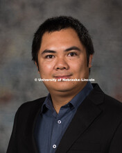 Studio portrait of Tri Lai, Assistant Professor, Mathematics, College of Arts and Science. New Facul