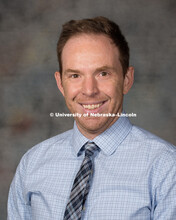 Studio portrait of Max Mueller, Assistant Professor, College of Arts and Sciences. New Faculty Orien