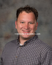 Studio portrait of Greg Simon, Assistant Professor, Glenn Korff School of Music. New Faculty Orienta