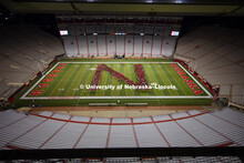 New Students pour out of the Tunnel Walk and formed the "N" on the field Saturday after the Boneyard