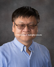 Studio portrait of Yongfeng Lu, Professor, College of Engineering. May 9, 2018. 
