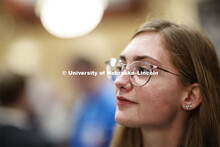 Carly Thody, a junior in environmental studies, look over the possibilities during day two of the Ca