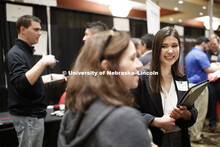 Sarah Clark, senior in computer science, talks with a recruiter during day two of the Career Fair at