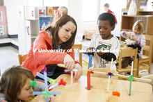 Monica Meyer, senior in Inclusvie Child Youth and Family Studies, works with children at the Malone 