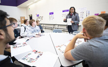 Abel Covarrubias, one of three dedicated western Nebraska recruiters, talks with interested juniors 