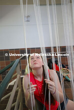 College of Architecture High School Workshop students use string to design in the atrium of the coll
