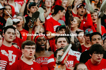 Students with shoes up for Shoes Off- Kickoff. Nebraska vs. Northern Illinois football game. Septemb