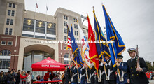 ROTC color guard leads the parade past Memorial Stadium. Cornstock celebration and Homecoming Parade