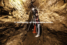 Dylan Downes, a sophomore in civil engineering from Lincoln, sets up the LIDAR in the well area of t