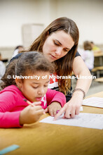 Samantha Wolff, a senior secondary education major, works with Hartley Elementary students during th