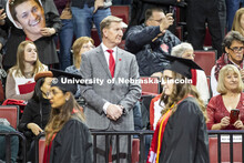 NU President watches undergrads enter the arena. December Undergraduate commencement at Pinnacle Ban