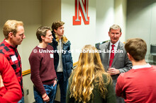 Student leaders talk with Ted Carter during the Jan. 16 pizza dinner in the Nebraska Union as part o
