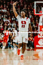 Jervay Green celebrates by giving the "Peace" sign after scoring. Nebraska vs. Wisconsin State Unive