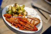 East Campus Dining Center photo shoot. Students eating and socializing at the East Campus Dining Cen