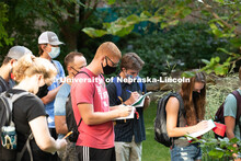 Students listen in Kim Todd's herbaceous id course in the Plant Science building courtyard. First da