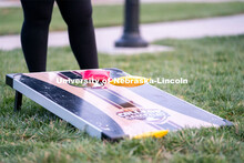 Beanbags land on the board during the ASUN Cornhole Competition at the Cather-Pound Greenspace on We