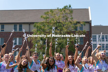 Sororities celebrate the arrival of new members during Sorority Rush Bid on the Vine Street fields. 