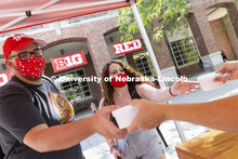 Ryan Marlatt and Taylor Durbin receive ice cream at Wednesday’s social. Students lined up at the I