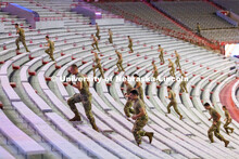 Army ROTC cadets and cadre run the west stadium steps Thursday morning. UNL ROTC cadets and Lincoln 