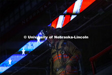 Lincoln Fire Department, Matt Woitalewicz runs the steps of west stadium. UNL ROTC cadets and Lincol