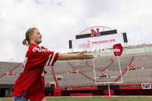 Abi Schoup, a senior on the mortar board team, tosses a bag during their competition Wednesday. Home