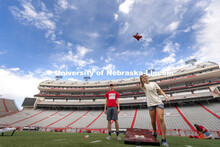 Kendra Lorence, a junior with the Alpha Omicron Pi team tosses a bag during the semi final match. Ho