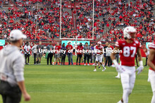 Husker recruits watch the pregame warmups from the field before the Nebraska vs Northwestern Univers