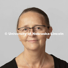 Studio portrait of Christy Aggens, Student Services Coordinator for Art, Art History and Design, Hix