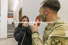 Spc. Allen Castaneda surprises his sister, Priscila, at the end of her criminal justice class. Casta